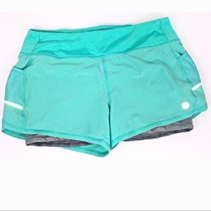 Athleta reflective shorts Medium pastel blue/green